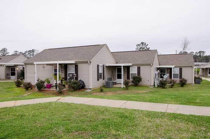 small homes with manicured yards