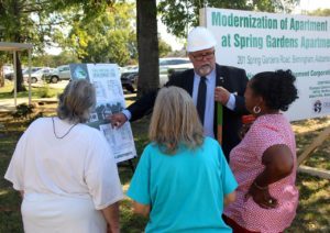 CHA Executive Director Ken Vaughan shows plans for new apartments to Spring Garden residents