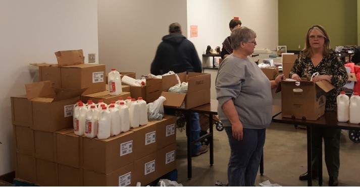 Volunteers packing food for the food bank